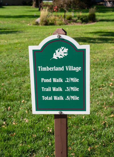 Timberland Village Walking Trail Distances Sign